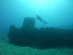 A sunk Mike Boat in the GTMO waters by Lora Tucker 